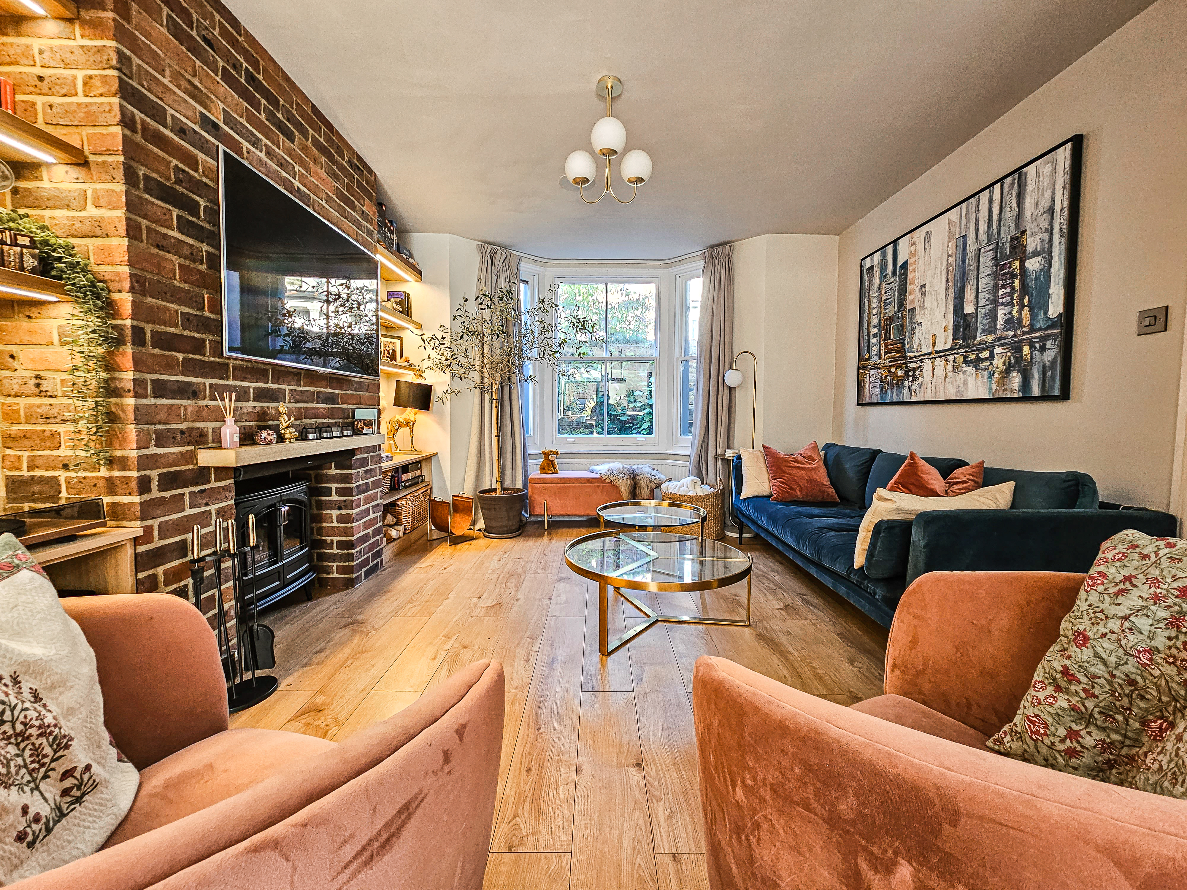 Living Room with Brick Fireplace