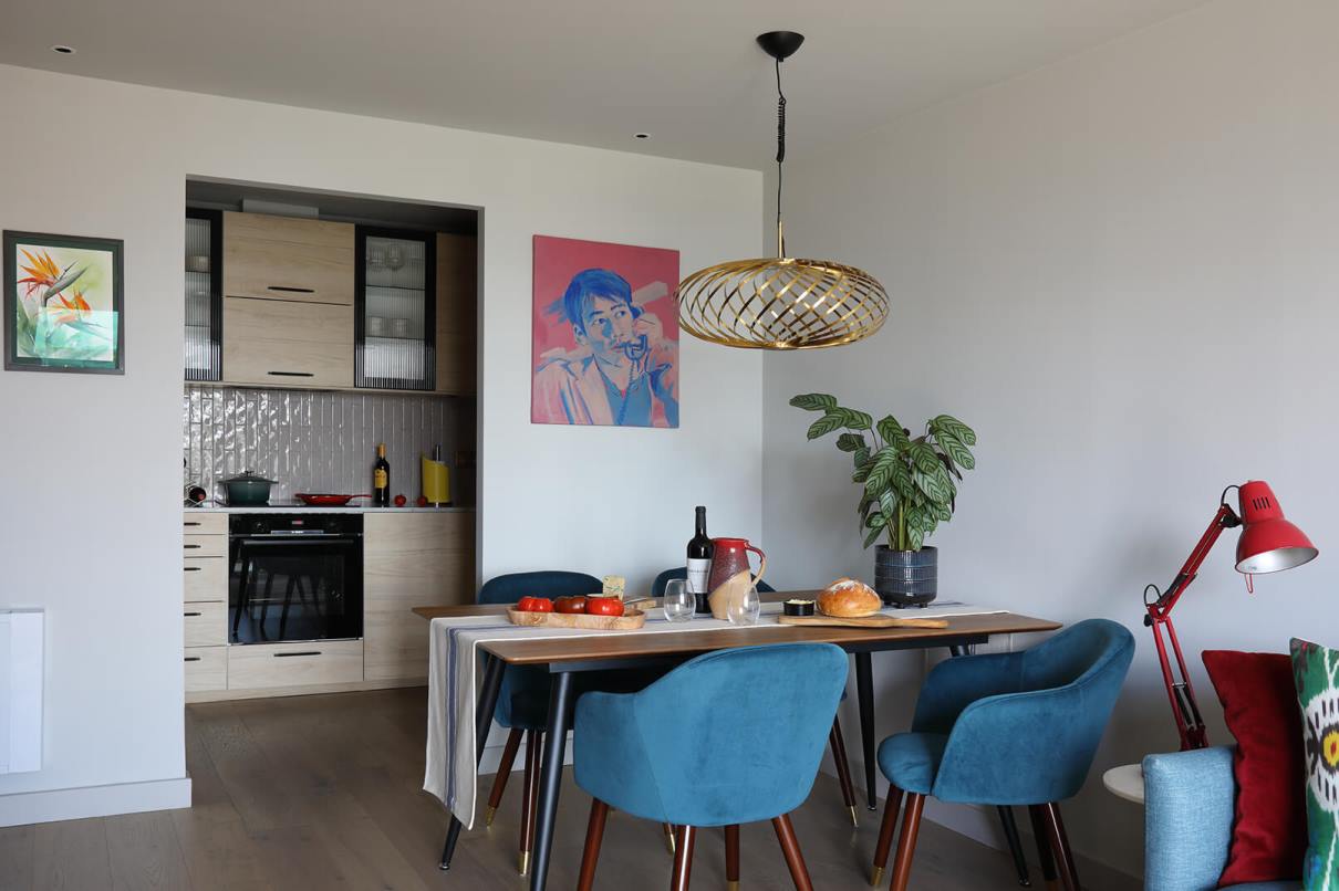 A view of the dining room and kitchen in this Limehouse refurbishment 