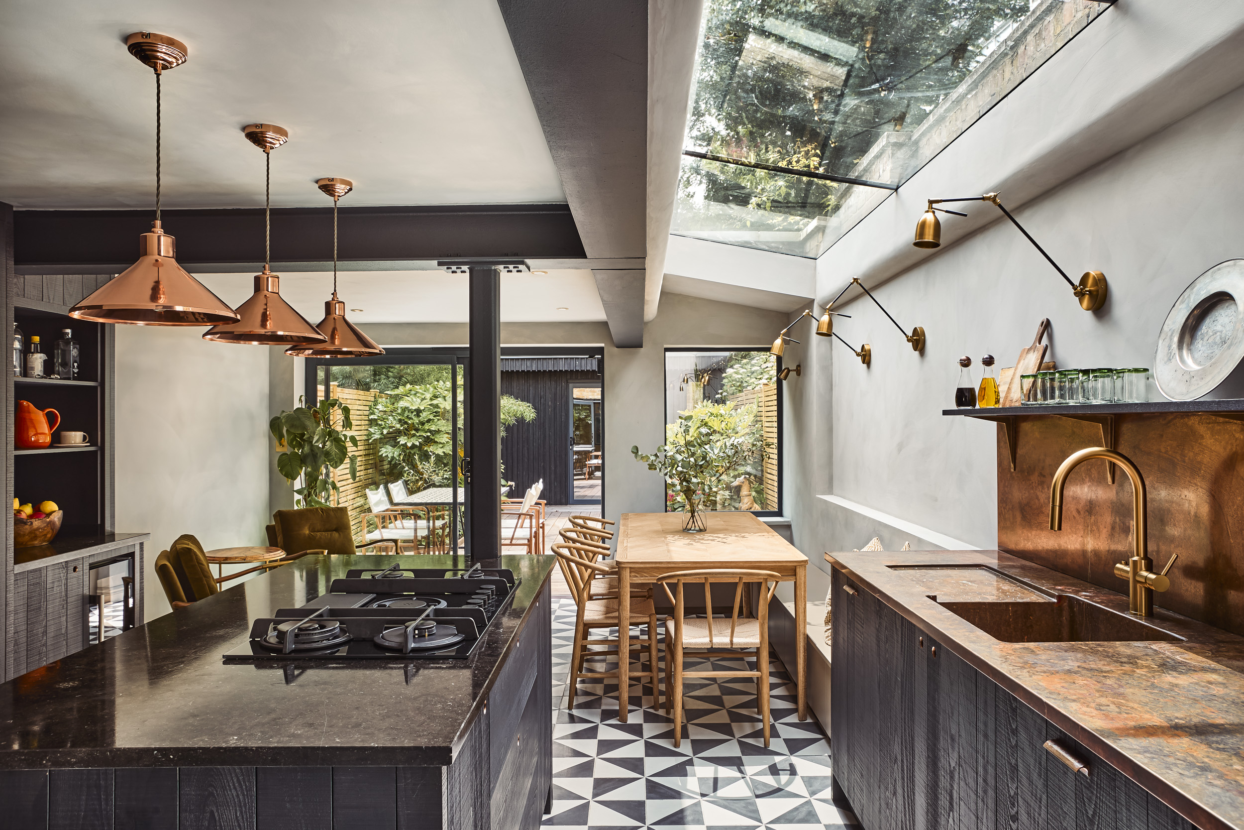 Kitchen view, complete with copper worktops and curved opening to roof light