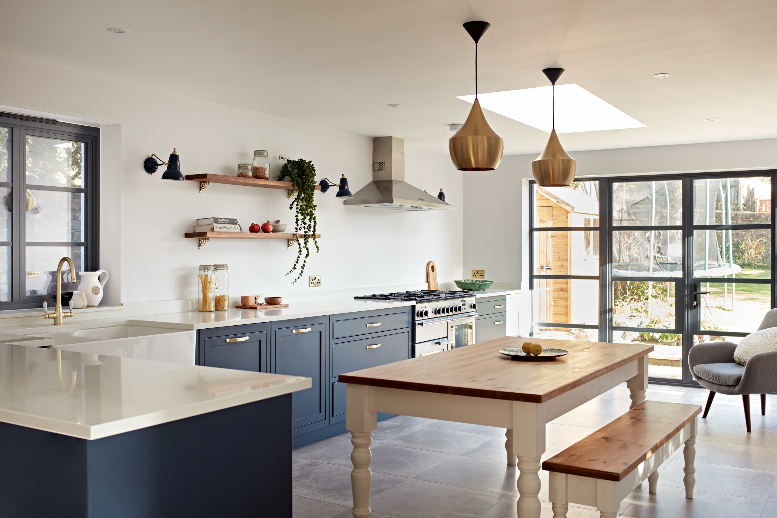 Crittal-Style windows flooded the kitchen / dining room with light and enabled the garden to become an extension to the space on warmer days