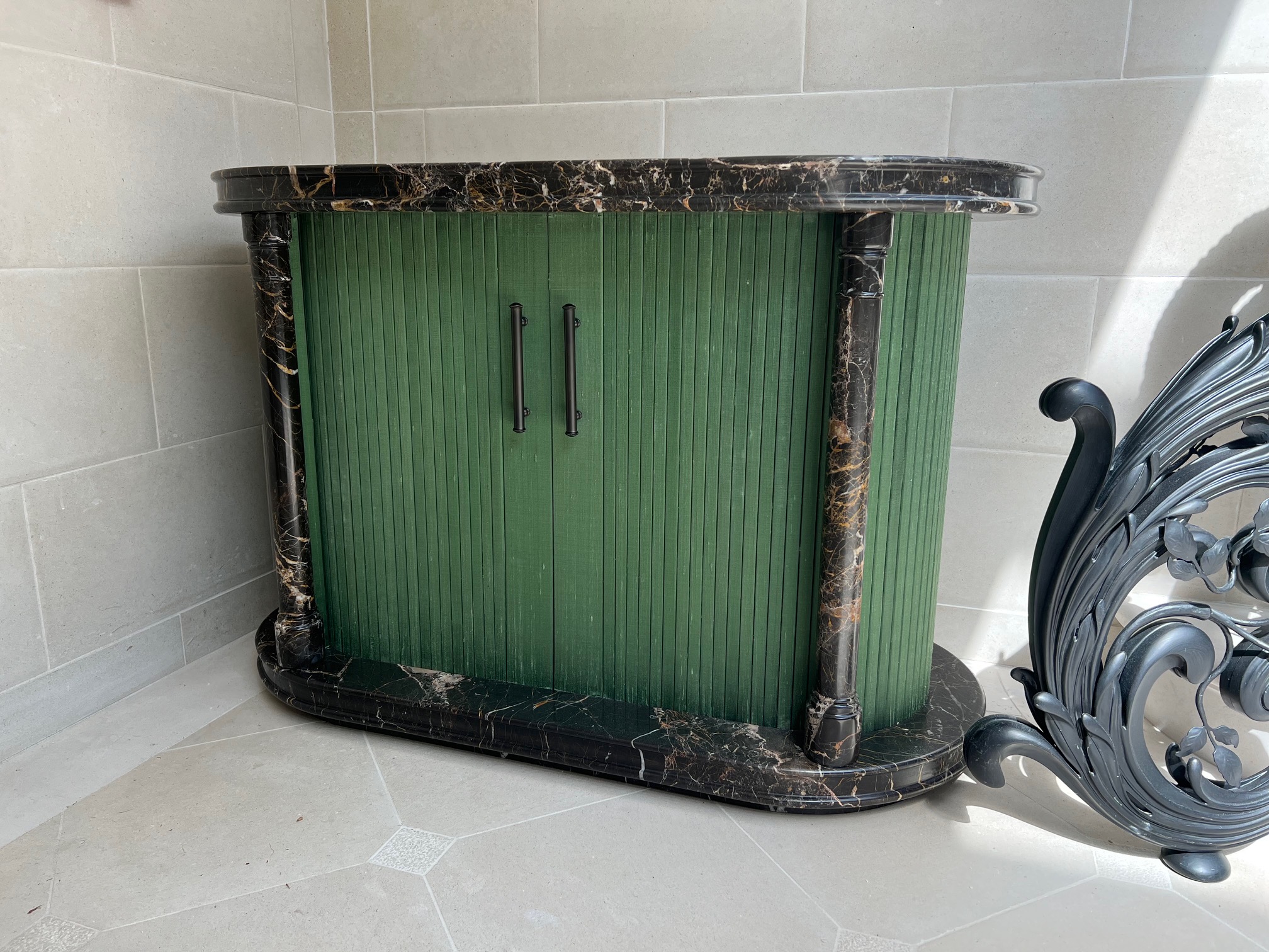 Tambour door shoe cabinet, with marble base and top, cabinet upholstered in silk 