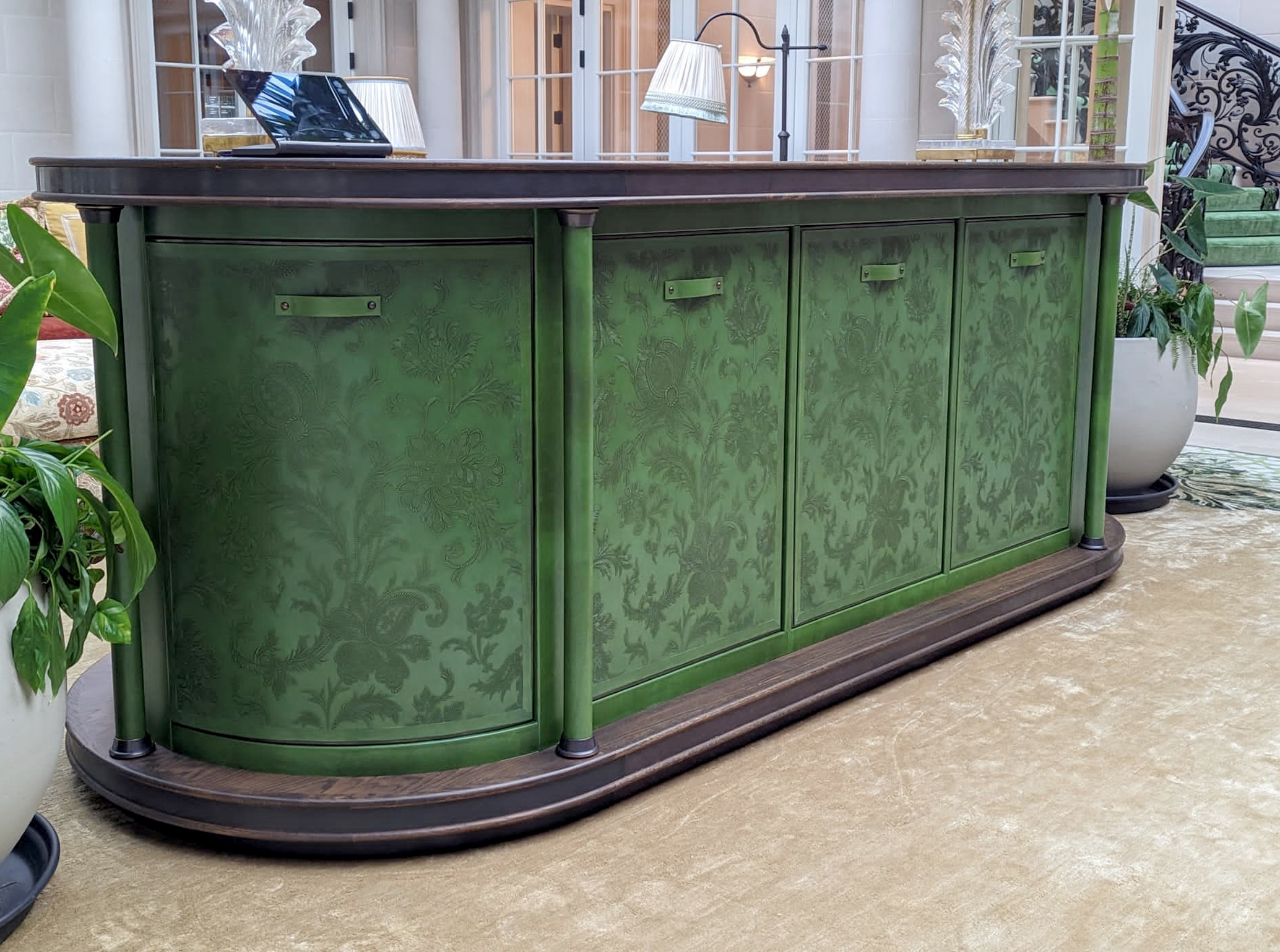 Bespoke freestanding pop up TV sideboard upholstered in embossed hand painted leather, with wooden top and bronze metal detailing