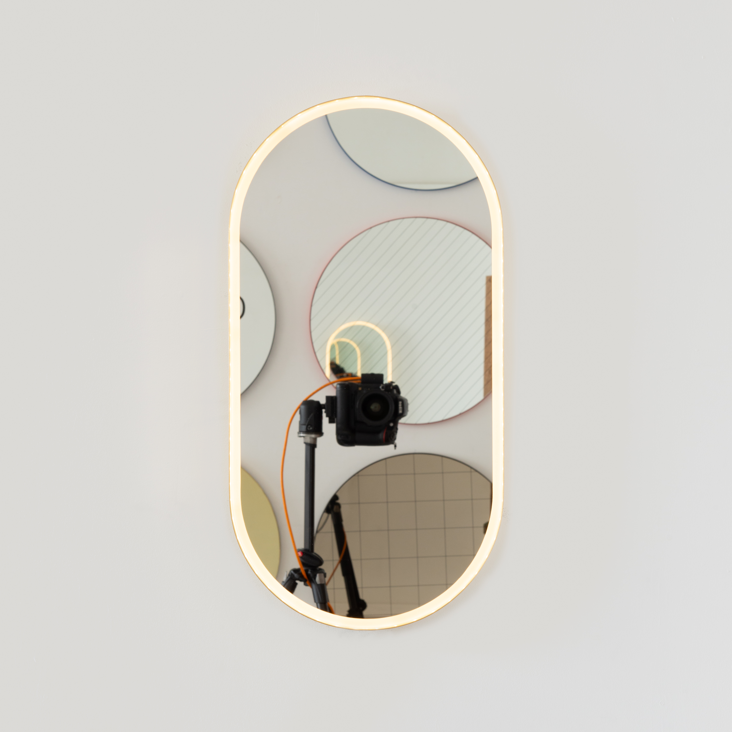 Capsula™ Front Illuminated Bathroom Mirror with Brushed Brass Frame