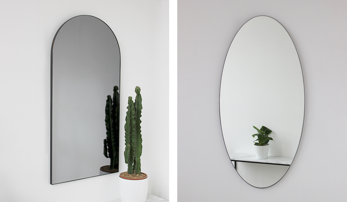 Arcus™ Arched Wall leaning Black Tinted Mirror (left) /  Ovalis™ Oval Shaped Mirror (right) 