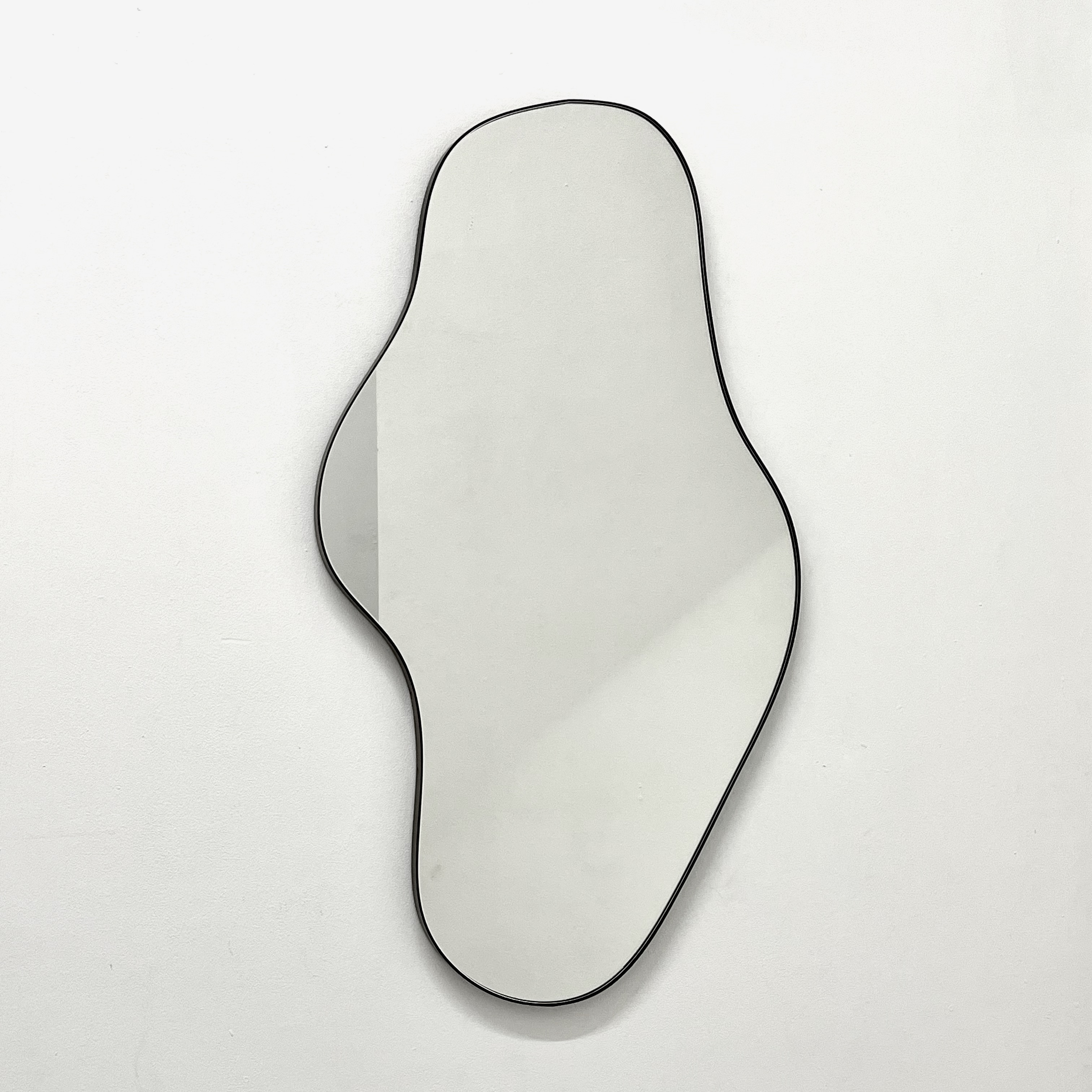 Bapa™ Irregular shaped Organic Mirror with a Bronze Patina Frame