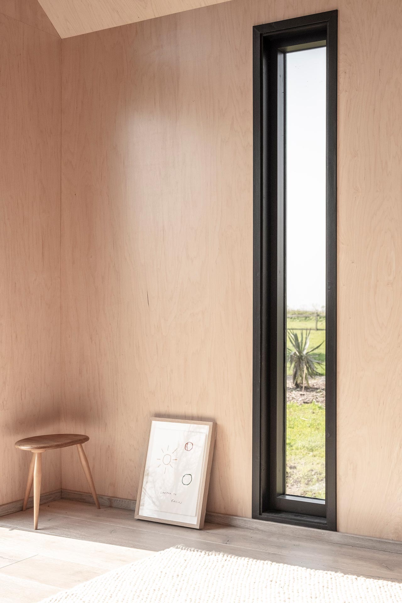 Light timber panels inside with window view