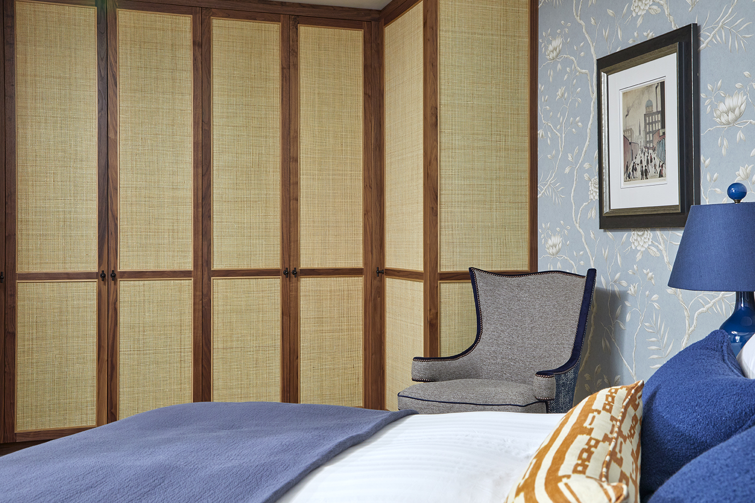 Bedroom with bespoke wicker wardrobes