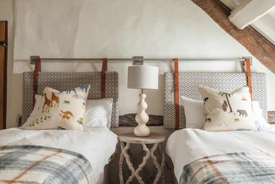 Children's Bedroom with checked throws and safari cushions