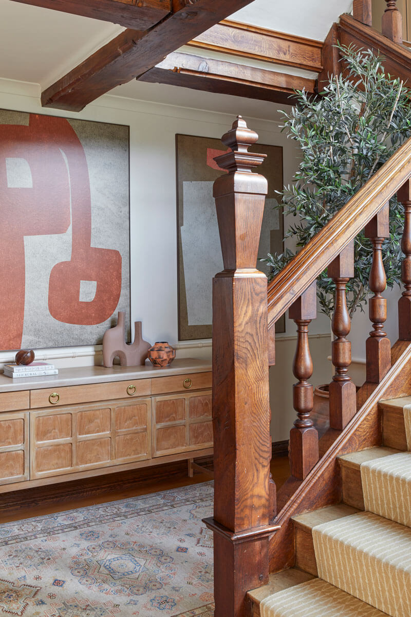 Hallway with vintage 1940's sidebaord, antique rug