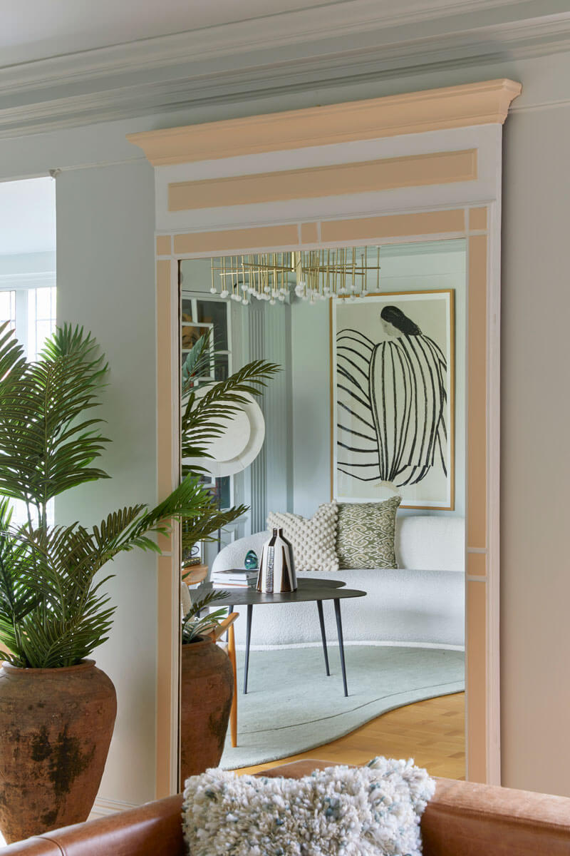 Living Room, with vintage mirror and urn with plant