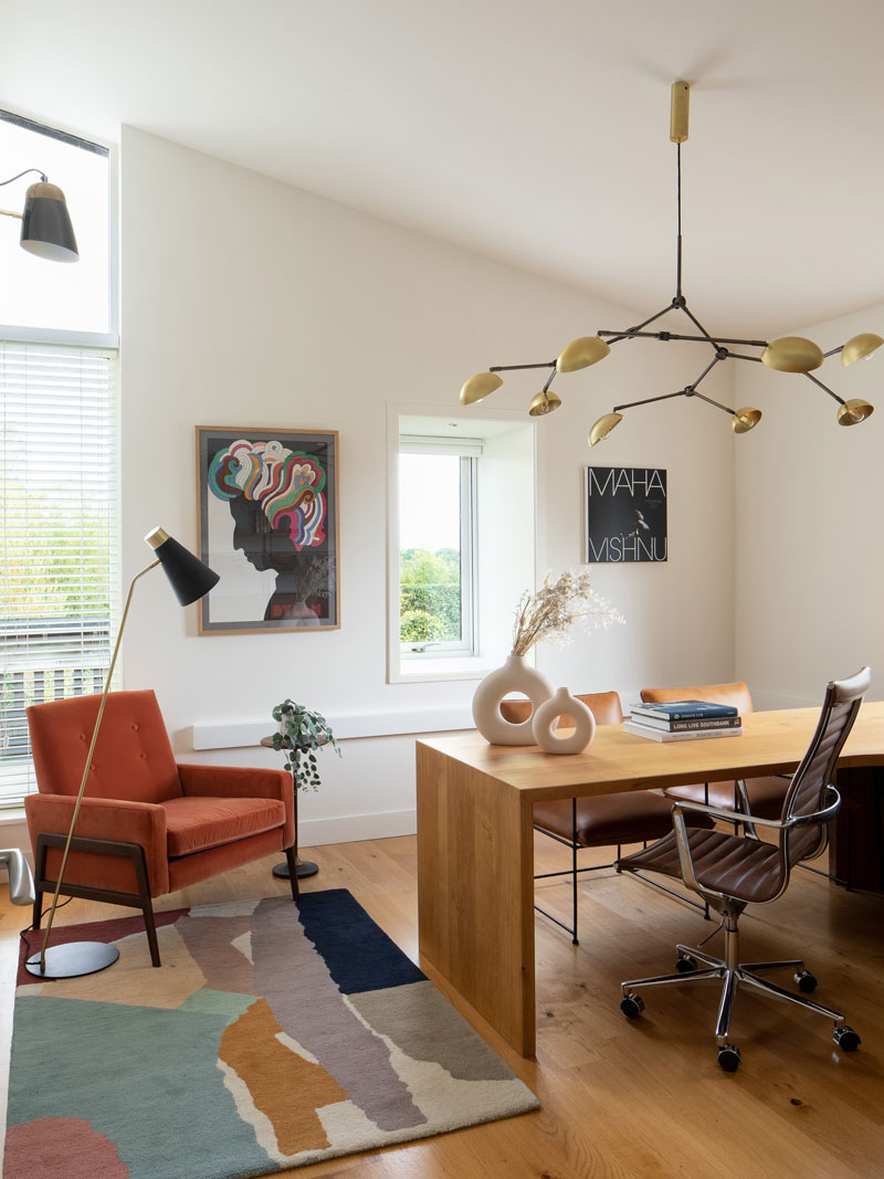 Office with mid century pendant and bespoke desk