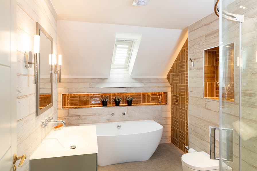 Statement bathroom with illuminated orange tiling 