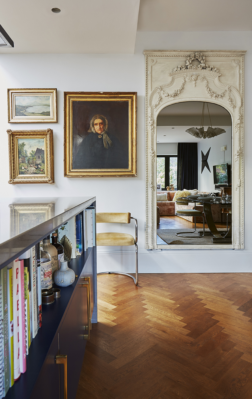 Antique mirror and art in modern Kitchen