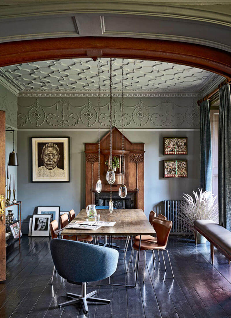 Formal Dining Room with Ochre pendant and fireplace, vintage chair and bespoke table