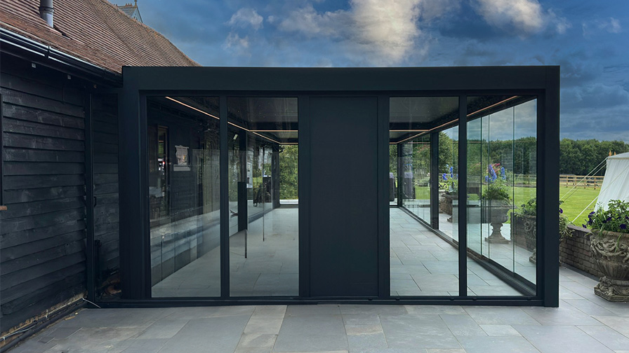 Anthracite double Louvre Pod with sliding glass doors and drop down screens