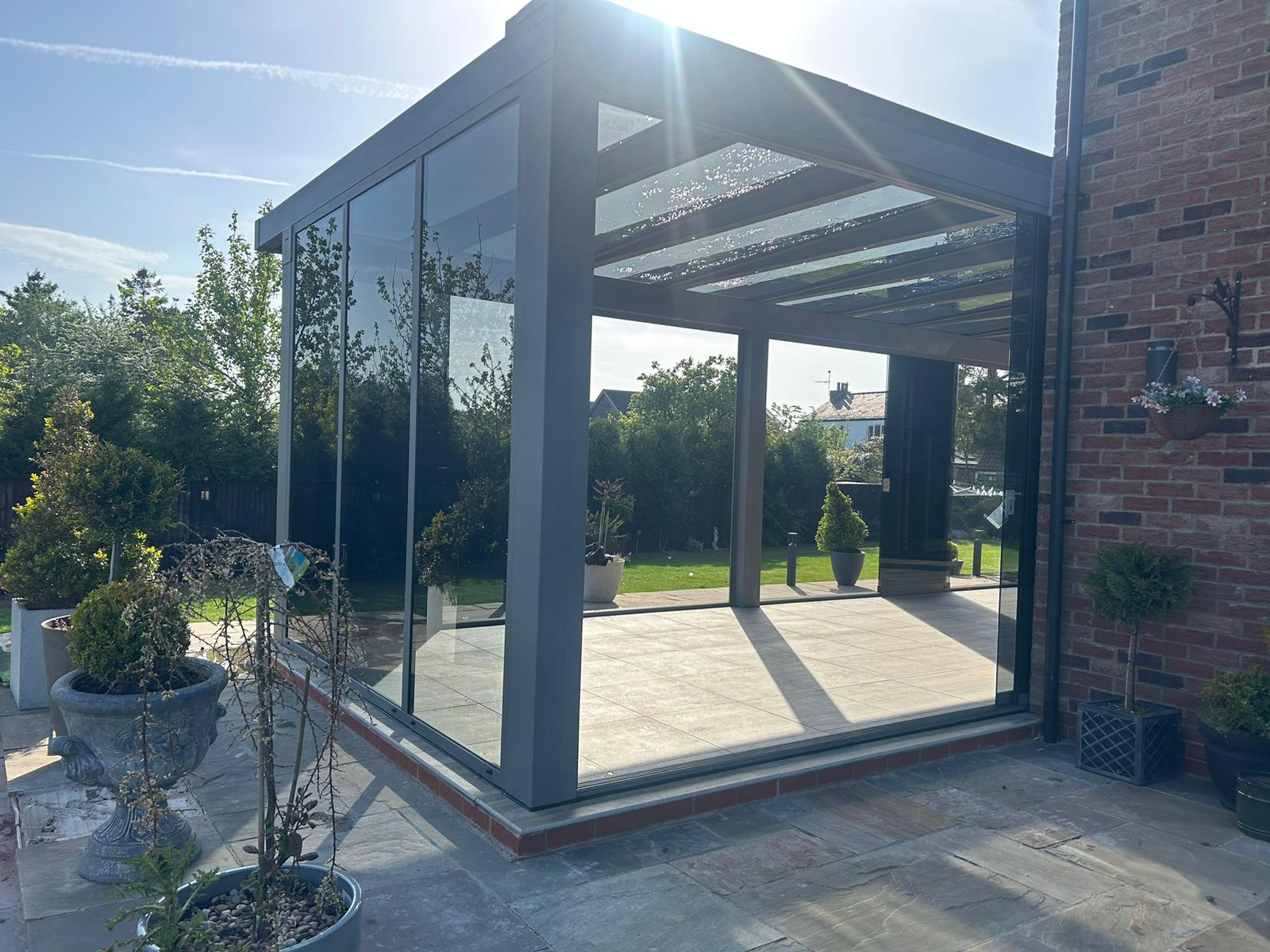 Mid-grey glass room with grey anti sun glass for sliding doors 