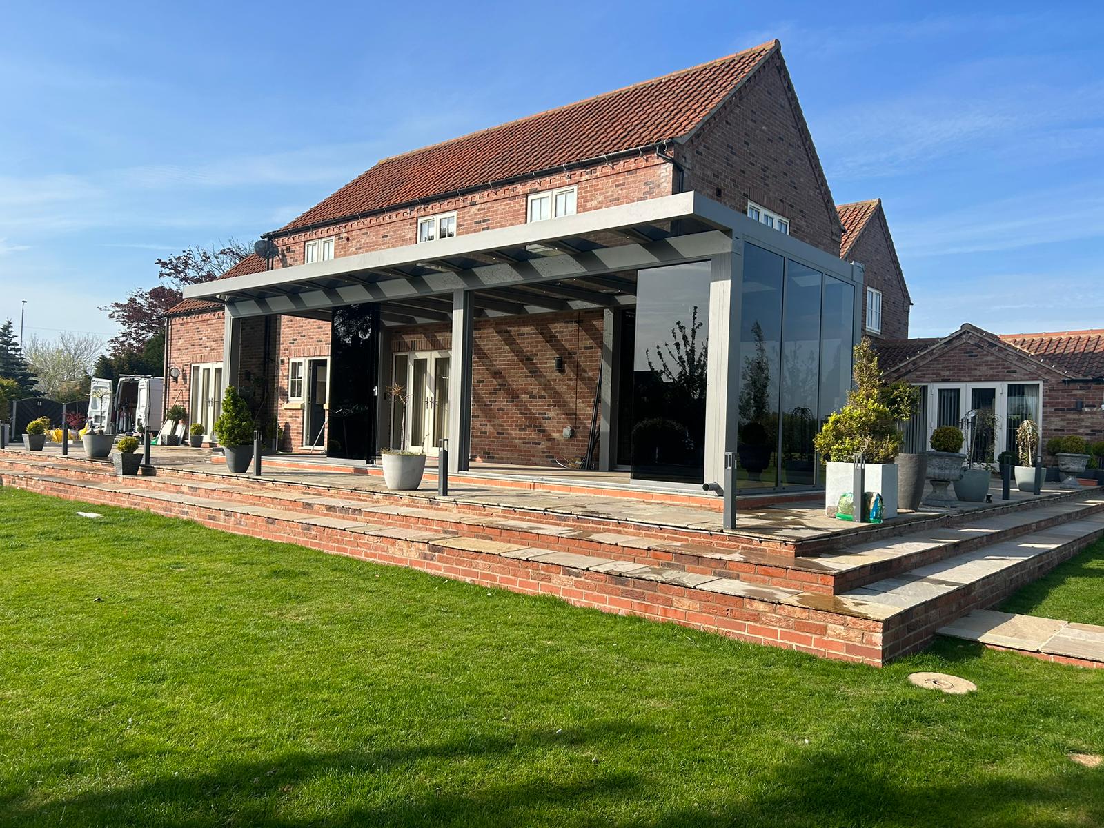 Mid-grey glass room with grey anti sun glass for sliding doors 