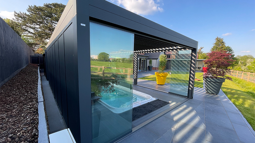 Louvred Roof pergola with glass sliding doors over a swim spa