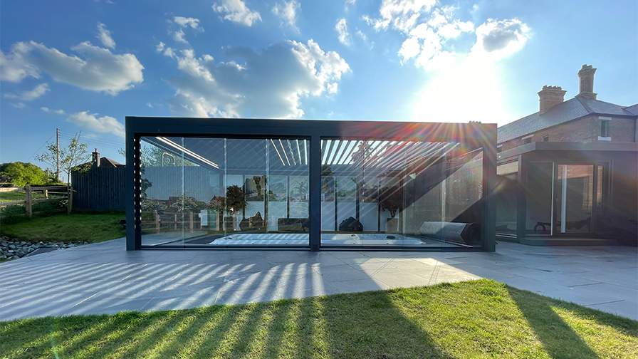 Louvred Roof pergola with glass sliding doors over a swim spa