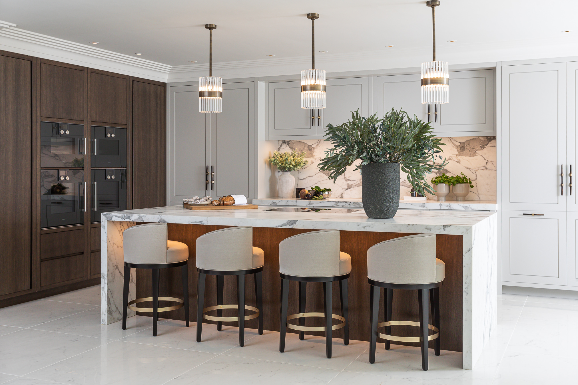 Contemporary classic kitchen with marble waterfall island.