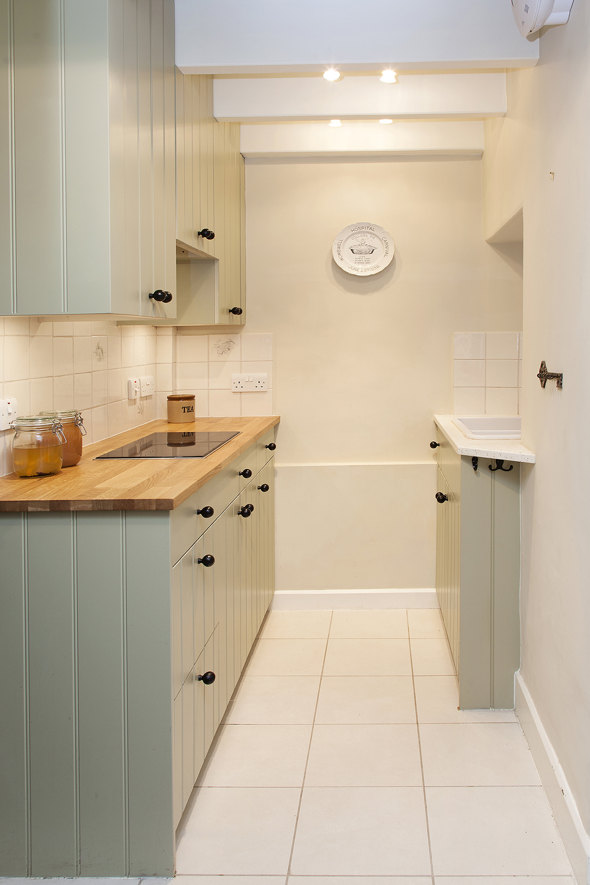 The galley kitchen was handbuilt maximizing every nook and cranny.