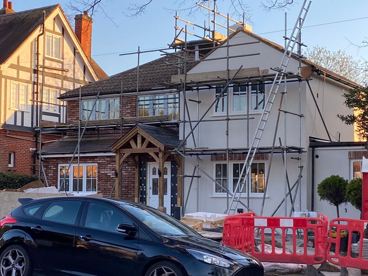 Brick Slips being installed onto the outside of a house