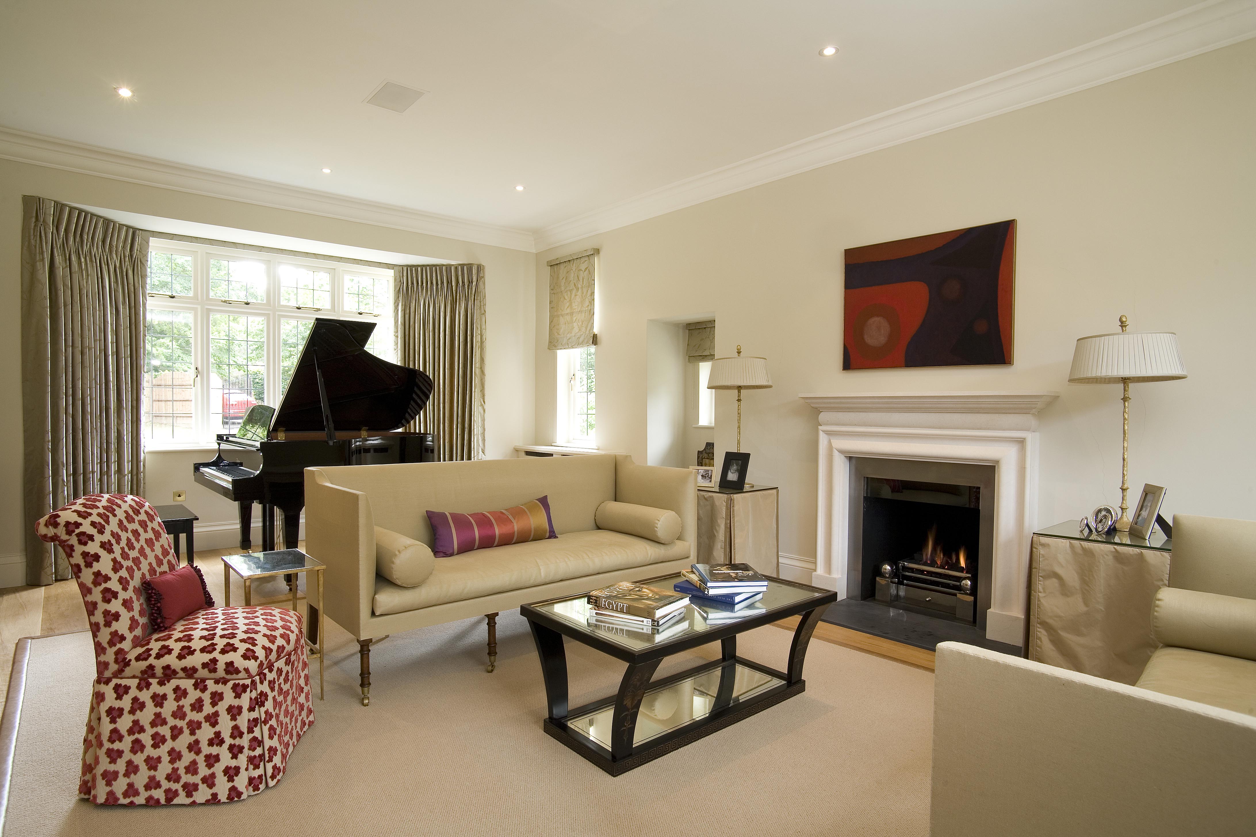 The lightness of the walls and flooring carried through from the hall with accents of the red and purple.