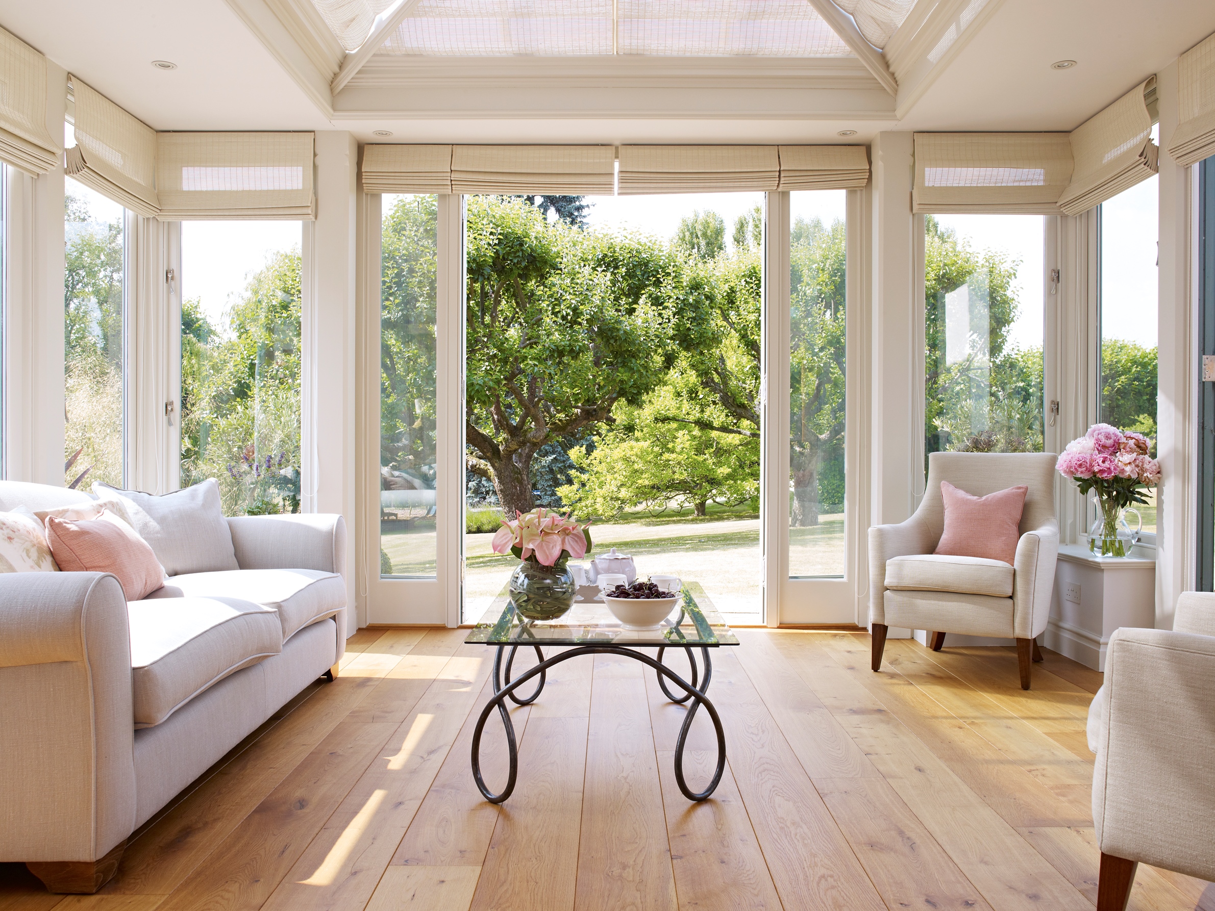 The newly constructed conservatory leads off and continues the sitting room theme with comfortable, relaxed seating for viewing the gardens