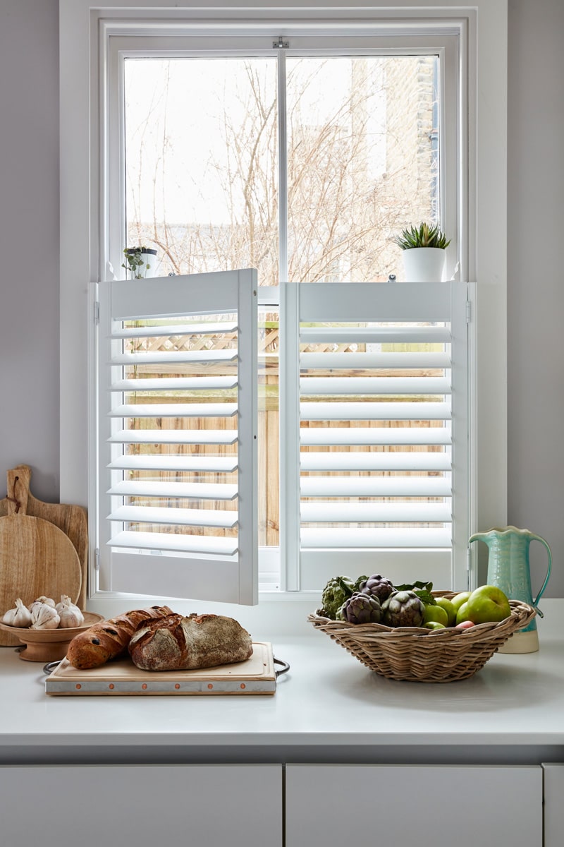 Café Style Shutters for Kitchen Windows by Plantation Shutters Ltd