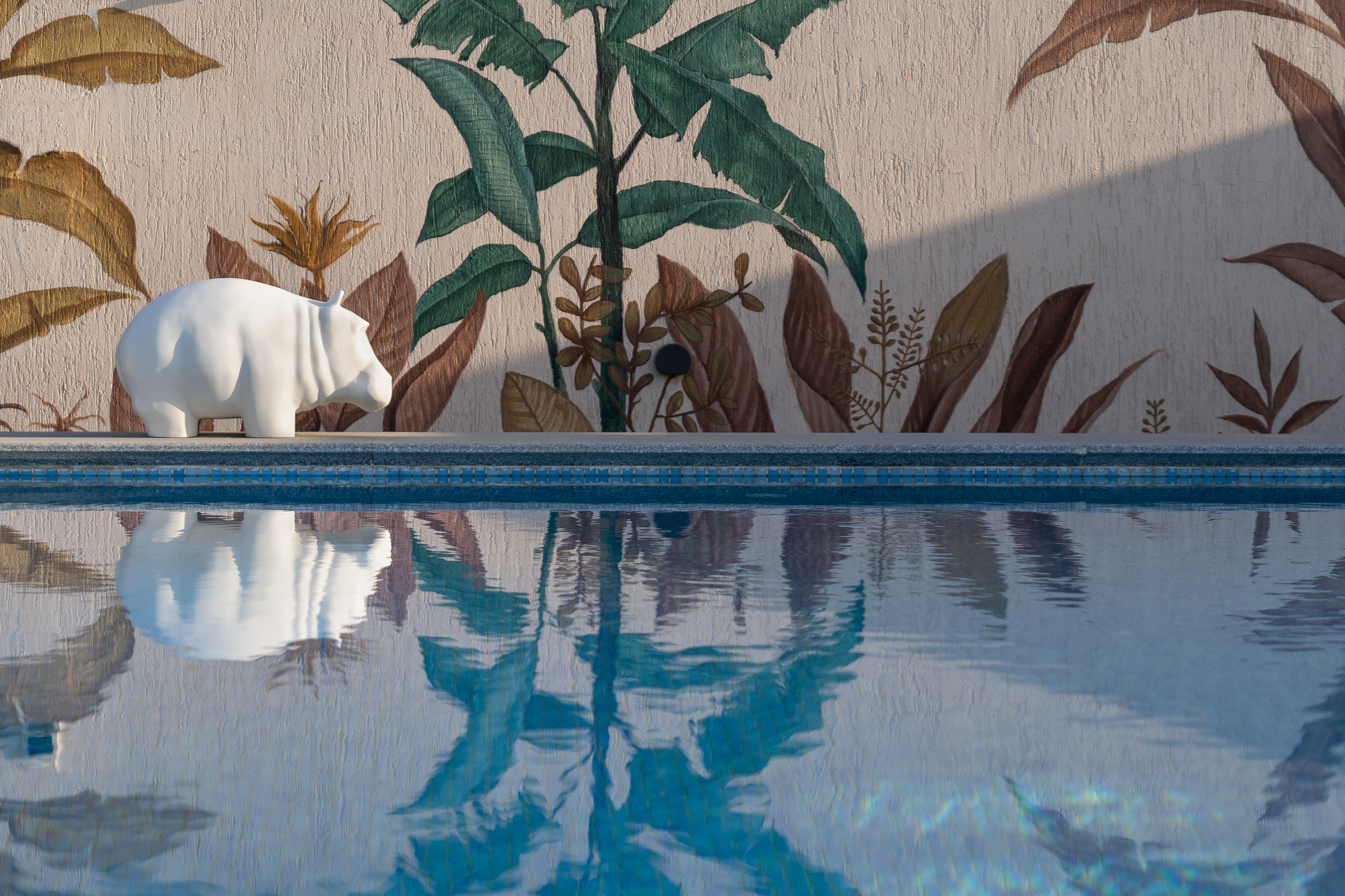 Roof terrace pool with mural