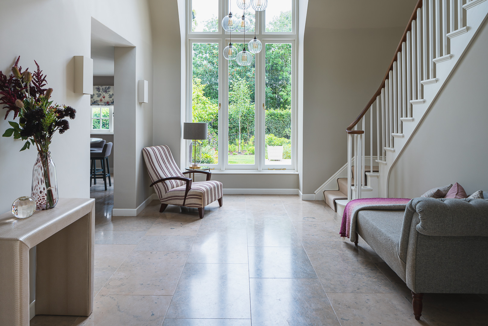 Double height hallway in a country style.