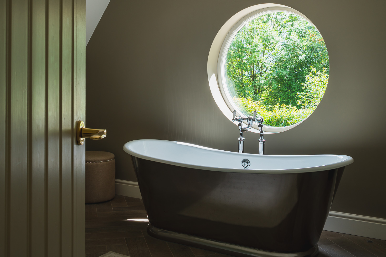 Porthole window, free-standing bath