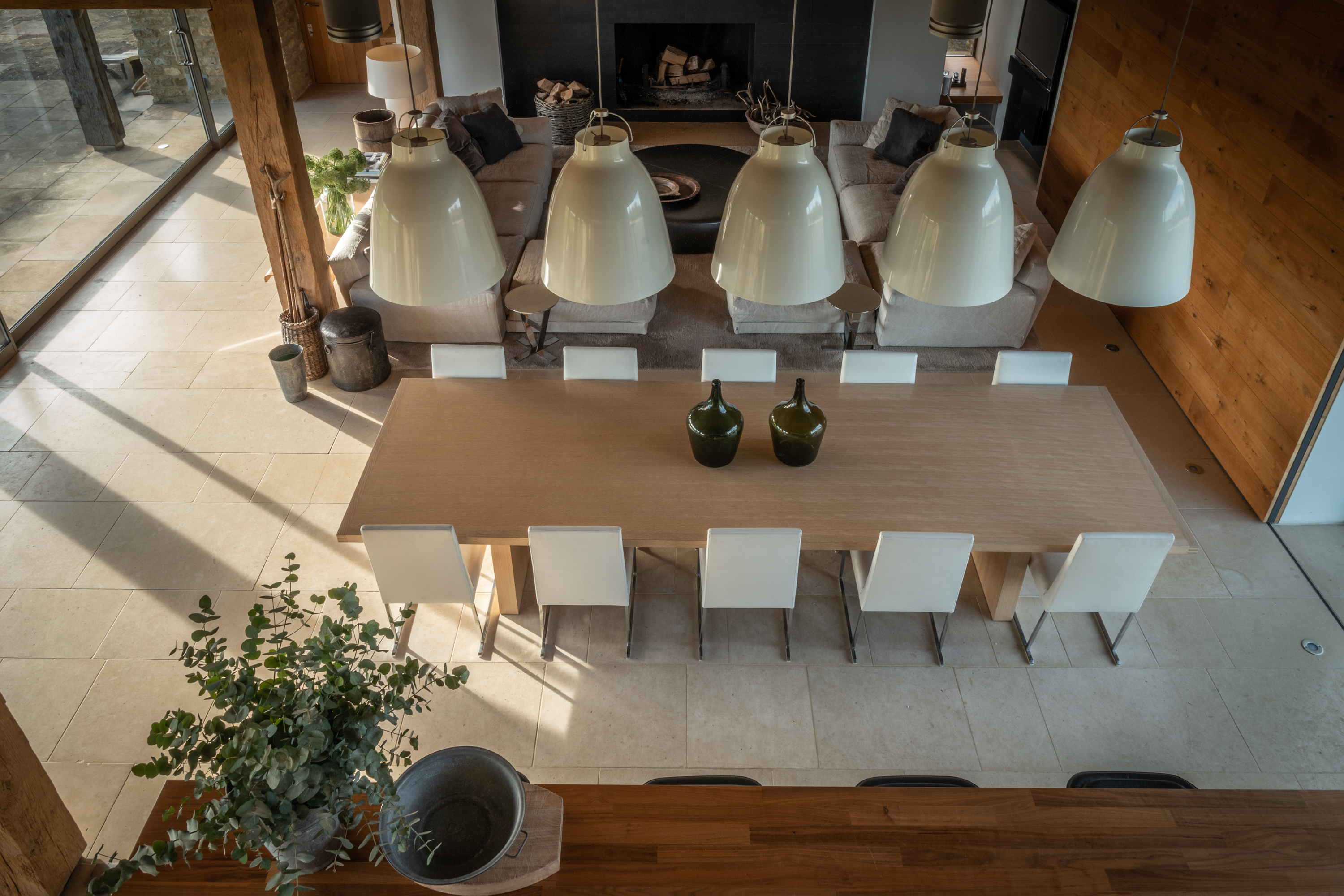 barn conversion cotswolds barn barn living B & B Italia sofa and cushions Rug company bespoke rug Barn interior