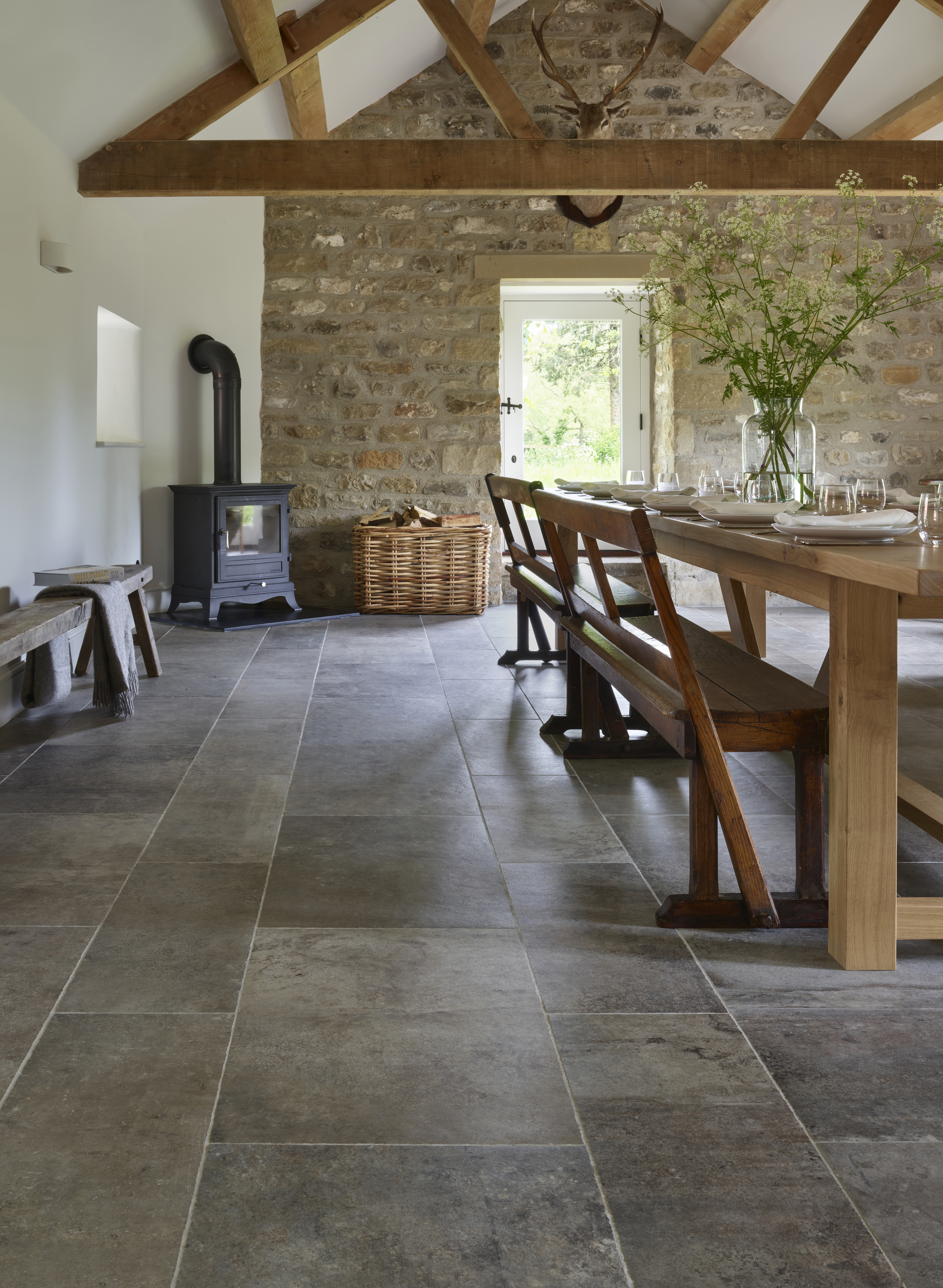 Stone porcelain floor provided by Lapicida in client dining area