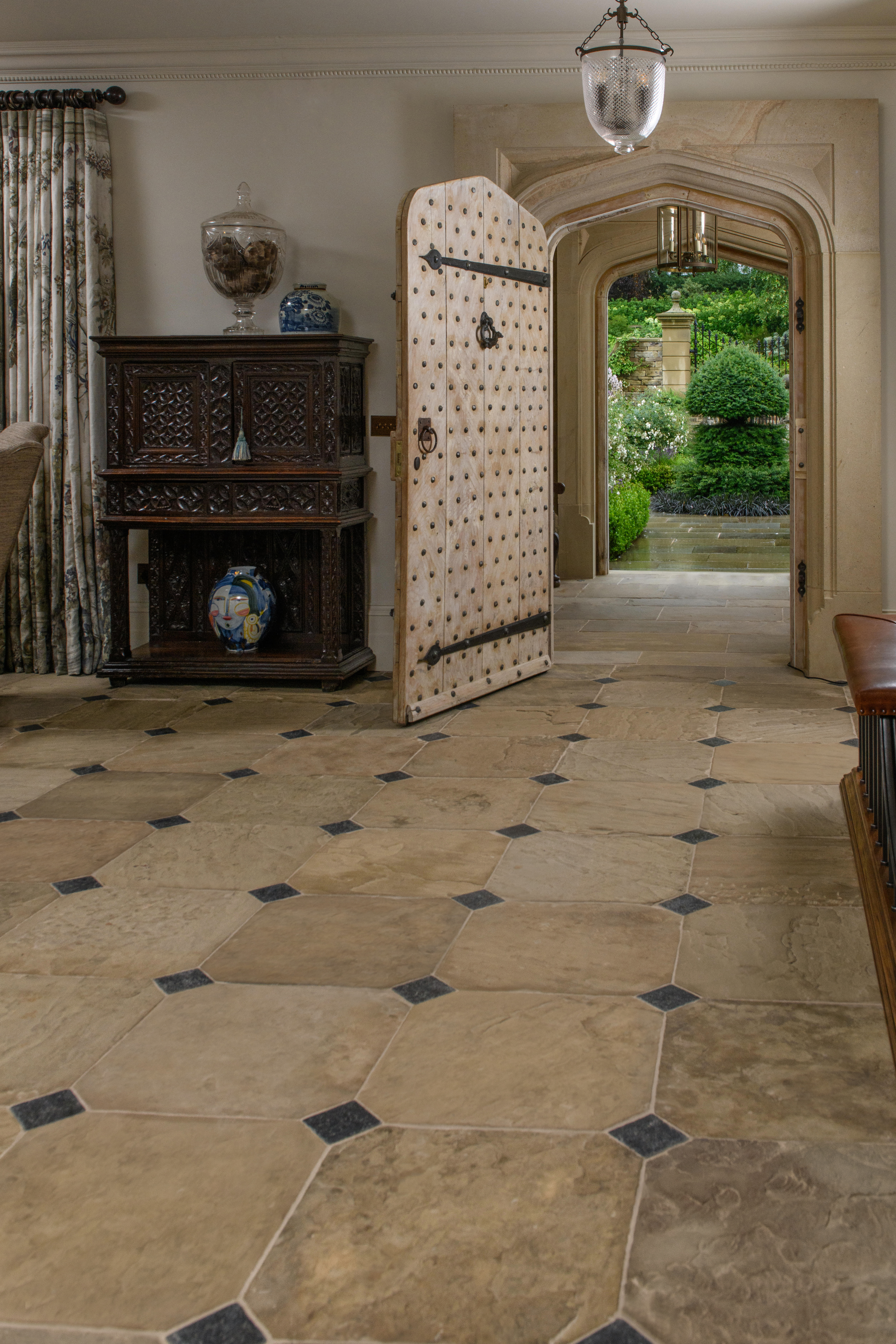 Reclaimed stone floor provided by specialists Lapicida in client hallway