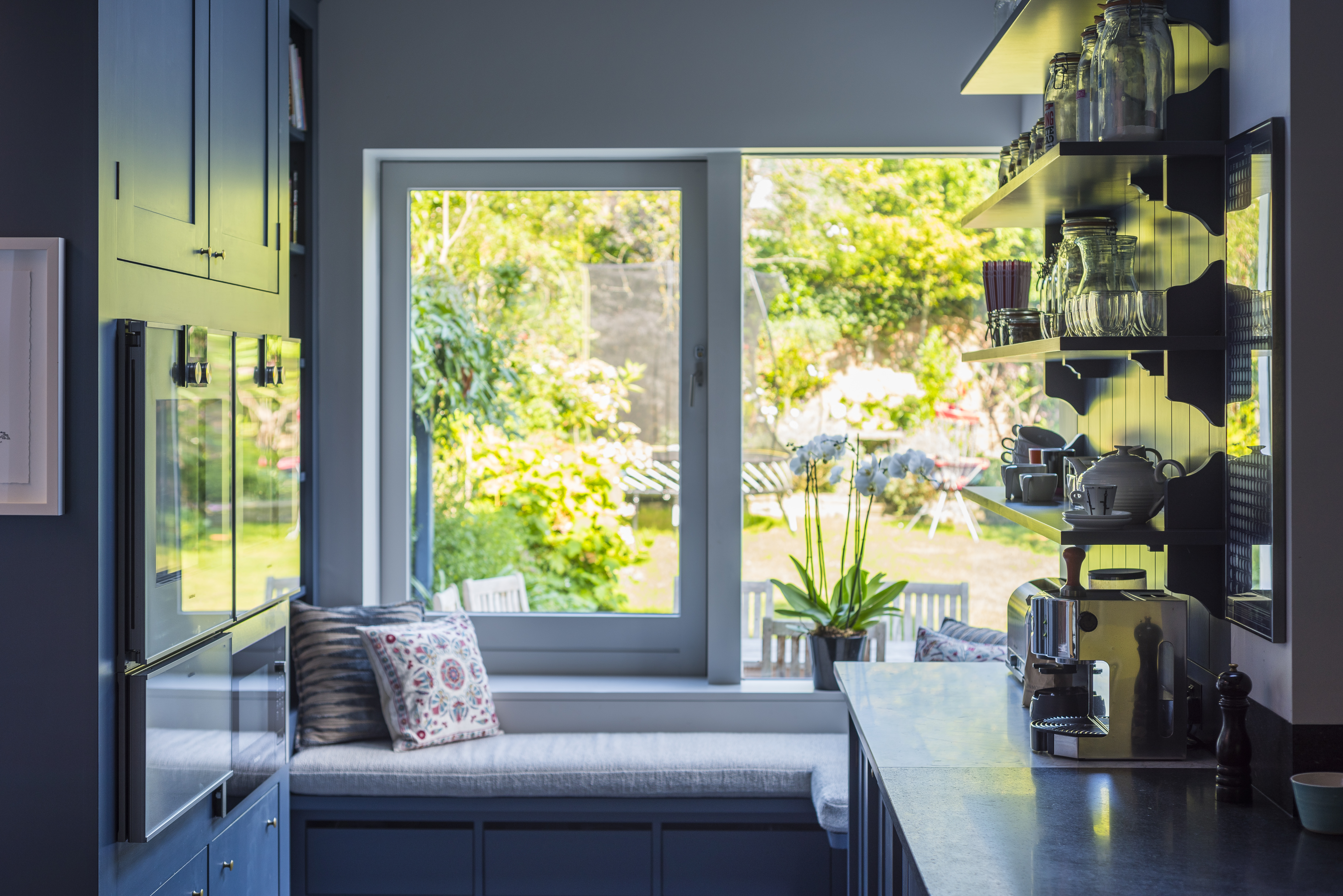 Kitchen window bench within a Shaker style kitchen