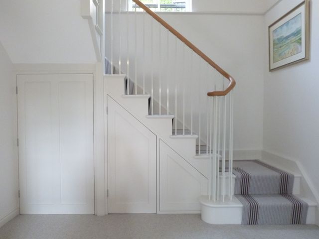 New staircase in simple Shaker style in cottage with Roger Oates stair runner