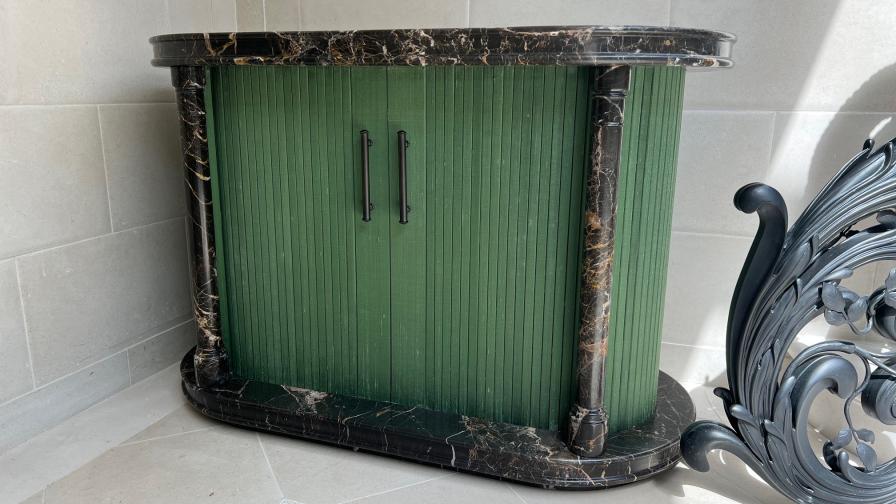 Tambour door shoe cabinet, with marble base and top, cabinet upholstered in silk 