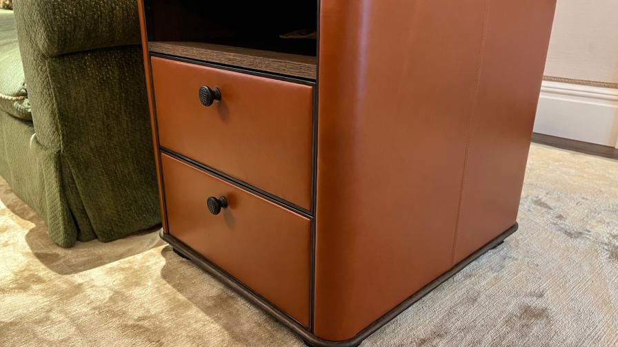 Leather side cabinet, with bronze metal trimming and marble top