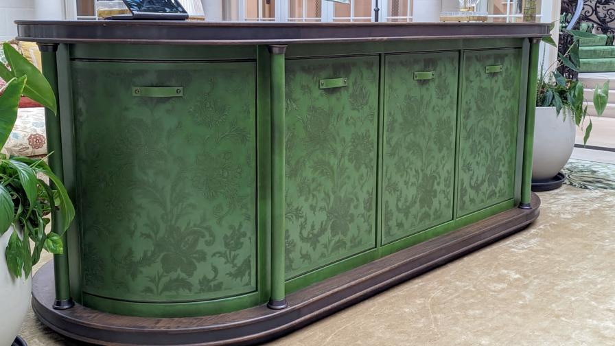 Bespoke freestanding pop up TV sideboard upholstered in embossed hand painted leather, with wooden top and bronze metal detailing