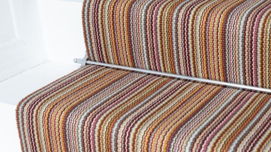 Multi-coloured stair runner with stair rod