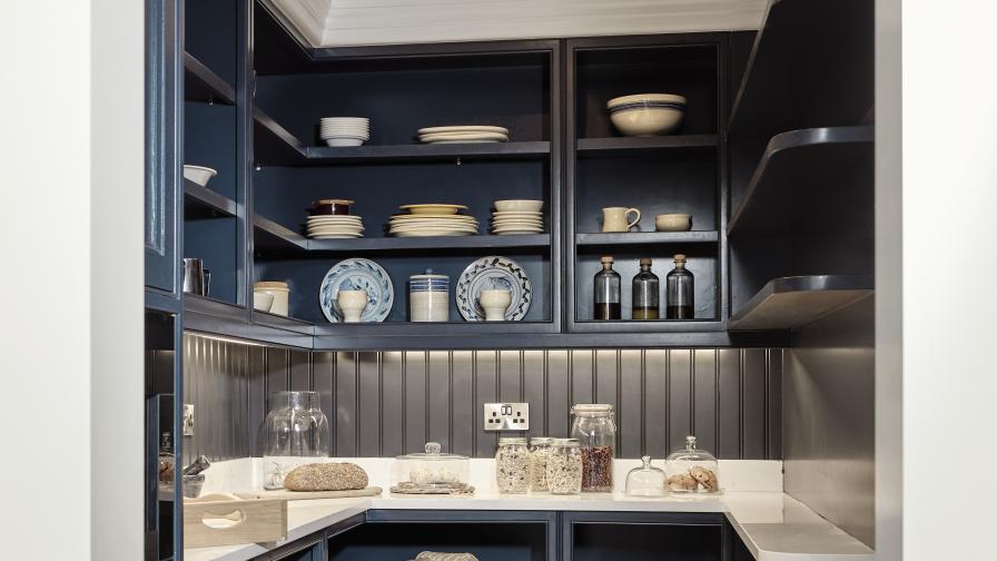 Walk in Pantry off the kitchen, painted in Christoff Thistle with italian porcelain tiles continuing on from the kitchen.