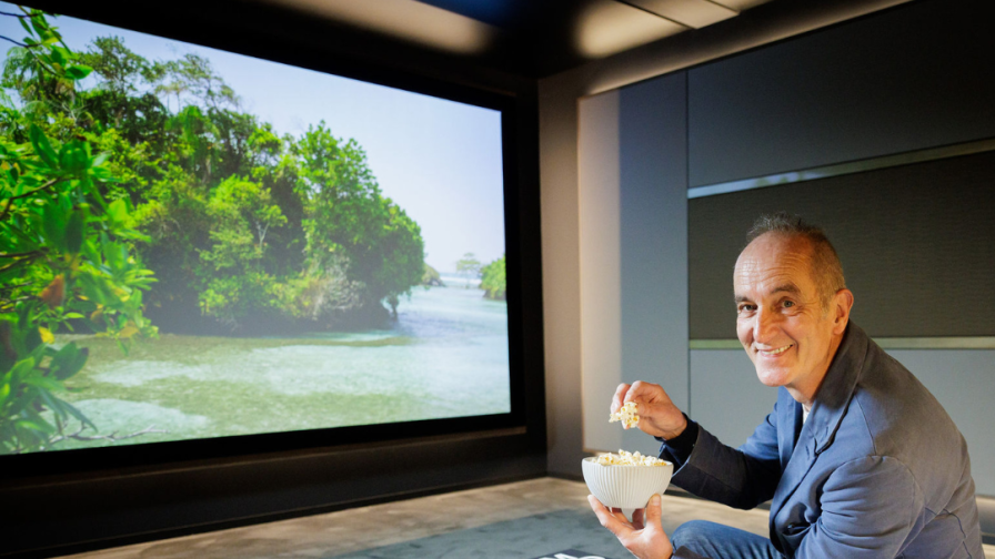 Kevin McCloud enjoying Butler Harwell's Cinema Room at ExCeL London