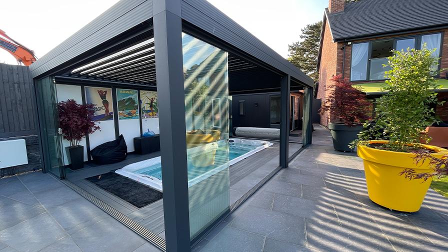 Louvred Roof pergola with glass sliding doors over a swim spa