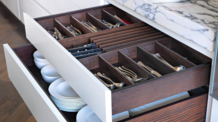 Stained oak cutlery and crockery drawers by Williams Ridout