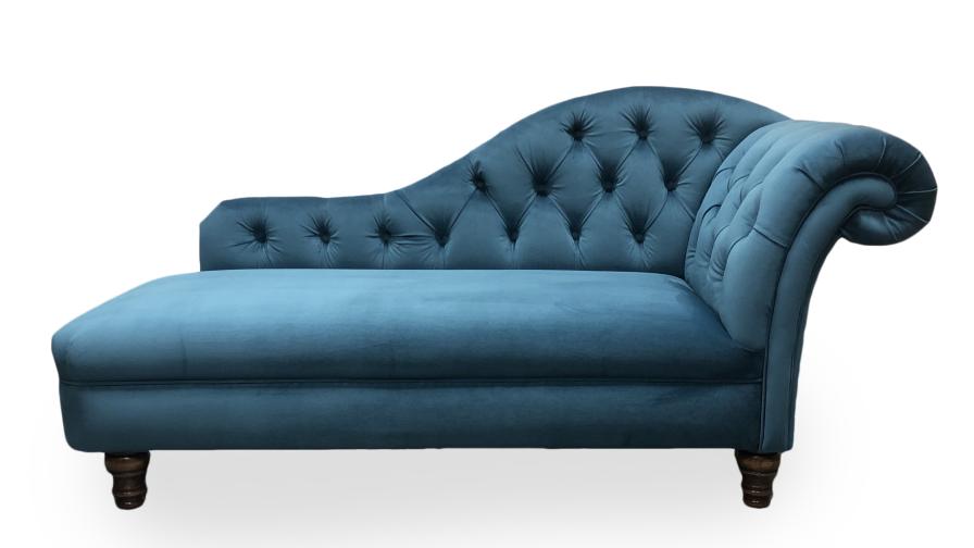 Blue velvet chaise longue with buttoned back and arm.