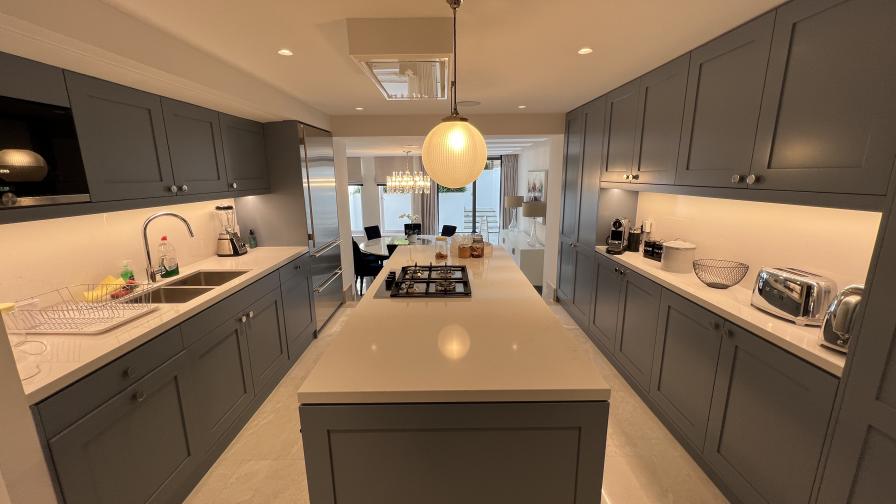 Kitchen area, with Crestron Home control.