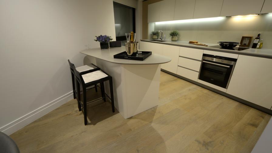 Fumed and Limed Lacquered Oak Floor fitted in kitchens throughout high rise development in London