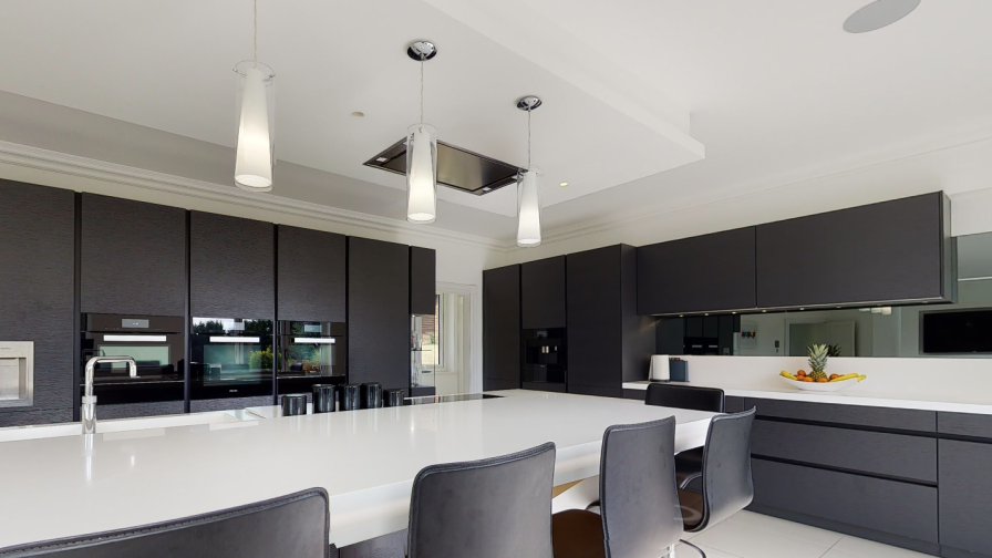 In-ceiling loudspeakers in the kitchen provide the audio.