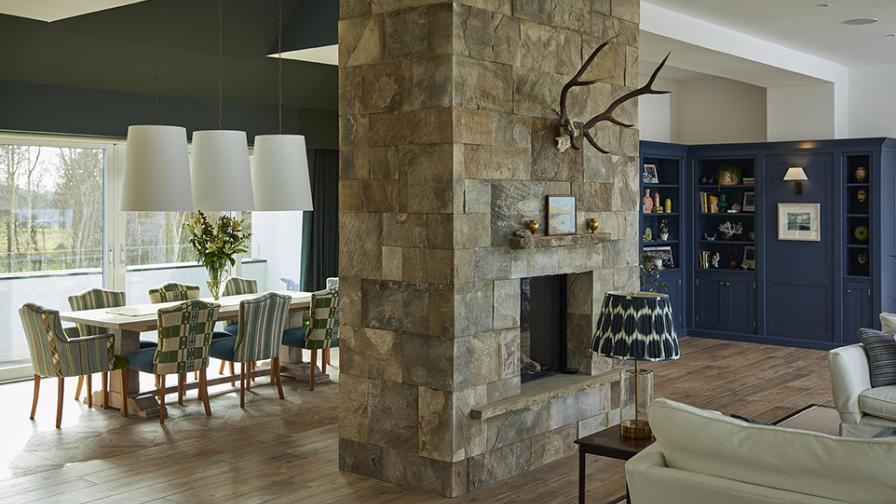 Lapicida reclaimed tiles on a impressive feature chimney